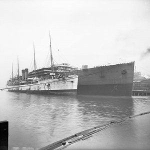 RMS Britanniic (1874) alonside RMS Cedric (1903)